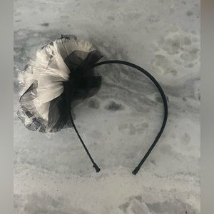 Black headband with flower accent